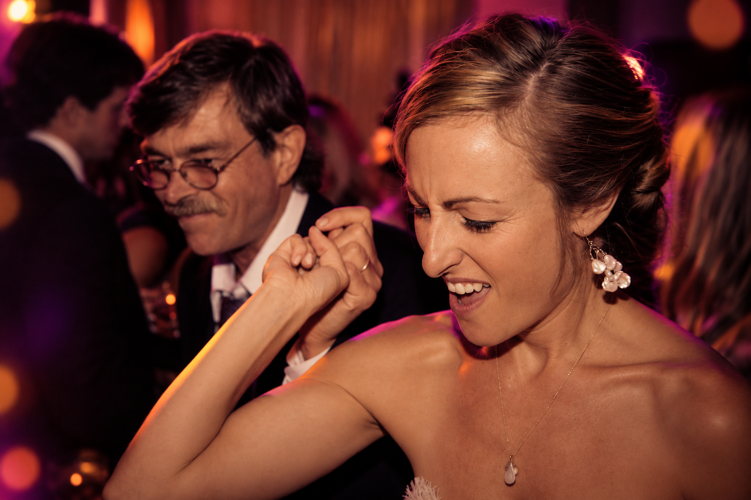 A bride dancing with her father
