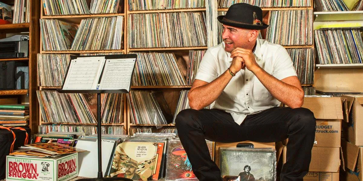 Goyo digging through records